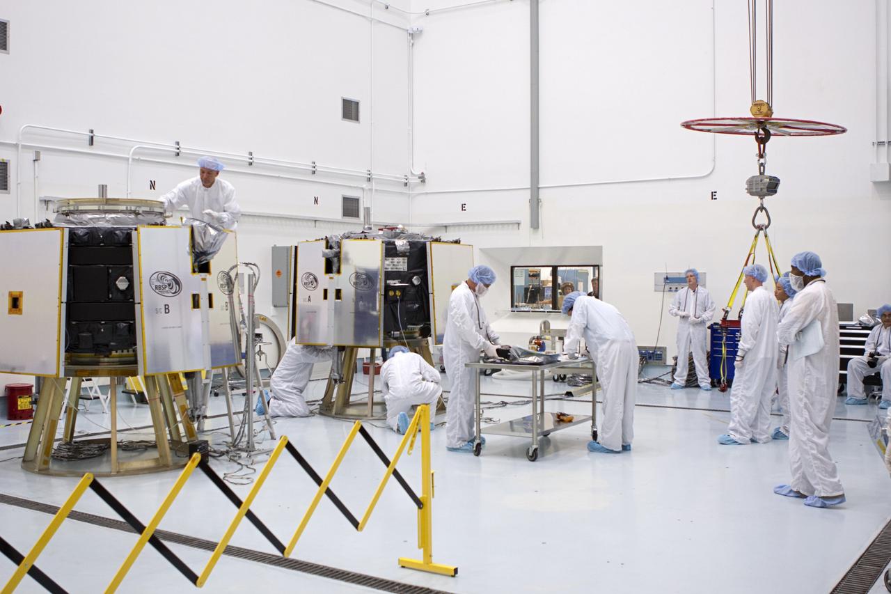 TITUSVILLE, Fla. - Inside the Astrotech payload processing facility in Titusville, Fla. near NASA’s Kennedy Space Center, technicians checkout the two Radiation Belt Storm Probes, or RBSP, spacecraft prior to vertical stacking. NASA’s RBSP mission will help us understand the sun’s influence on Earth and near-Earth space by studying the Earth’s radiation belts on various scales of space and time. RBSP will begin its mission of exploration of Earth’s Van Allen radiation belts and the extremes of space weather after its liftoff aboard a United Launch Alliance Atlas V from Space Launch Complex 41 at Cape Canaveral Air Force Station, Fla. Liftoff is targeted for Aug. 23, 2012. For more information, visit http://www.nasa.gov/rbsp. Photo credit: NASA/Jim Grossmann