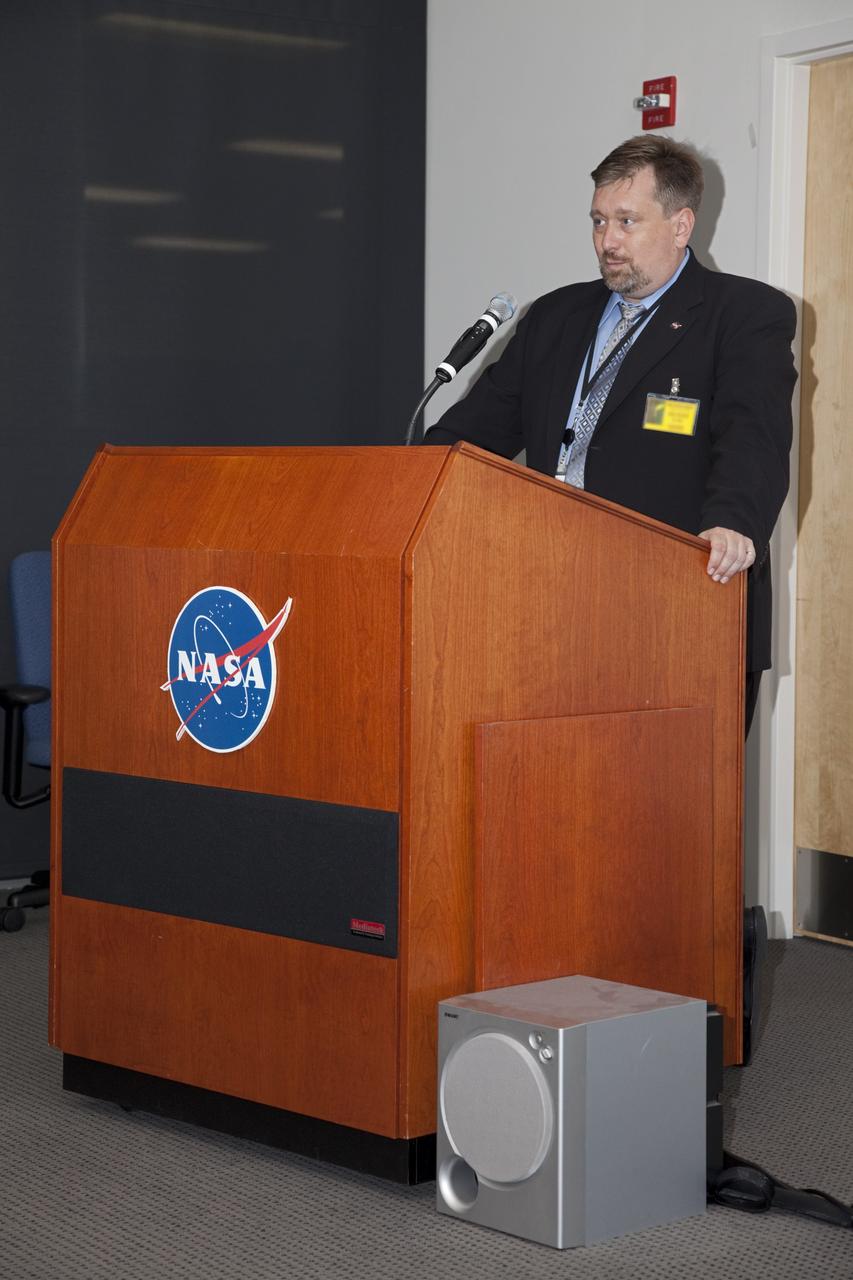 CAPE CANAVERAl, Fla. - Dr. Mason Peck, NASA's chief Technologist, speaks during a visit to the Space Life Sciences Laboratory at Kennedy Space Center. Peck toured the lab facility during a visit to the space center. Photo credit: NASA/Frankie Martin