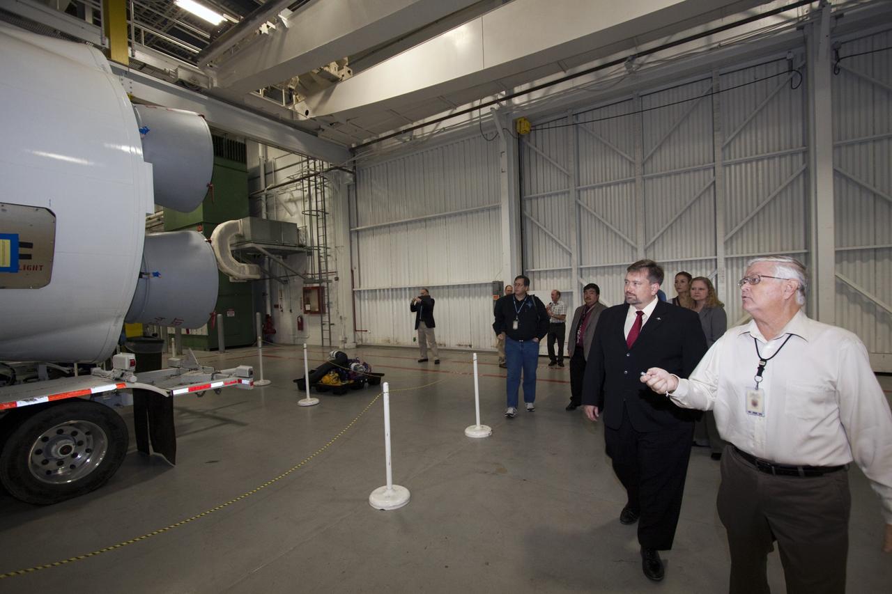 CAPE CANAVERAL, Fla. – Mike Woolley of the United Launch Alliance, right, shows an Atlas V rocket to Dr. Mason Peck, NASA's chief technologist, during Peck's visit to Cape Canaveral Air Force Station in Florida. Photo credit: NASA/Jim Grossman
