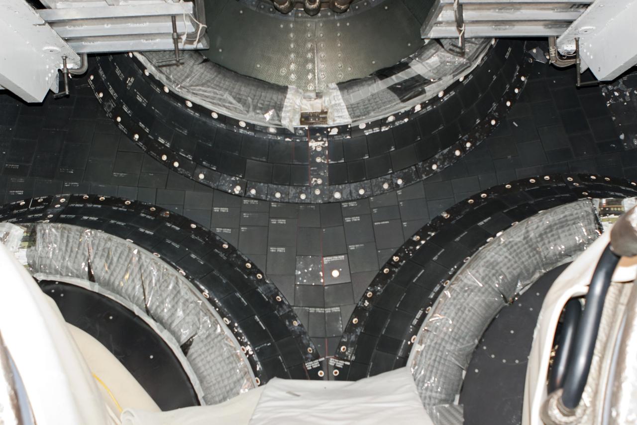 CAPE CANAVERAL, Fla. – In Orbiter Processing Facility Bay 2 at NASA’s Kennedy Space Center in Florida, the final heat shield carrier panel has been installed on the space shuttle Endeavour. The orbiter is now ready for its tail cone to be installed for the cross-country ferry flight.      The work is part of Transition and Retirement of the remaining space shuttles, Endeavour and Atlantis. Endeavour is being prepared for public display at the California Science Center in Los Angeles. Its ferry flight to California is targeted for mid-September. Endeavour was the last space shuttle added to NASA’s orbiter fleet. Over the course of its 19-year career, Endeavour spent 299 days in space during 25 missions. For more information, visit http://www.nasa.gov/transition Photo credit: NASA/ Frankie Martin