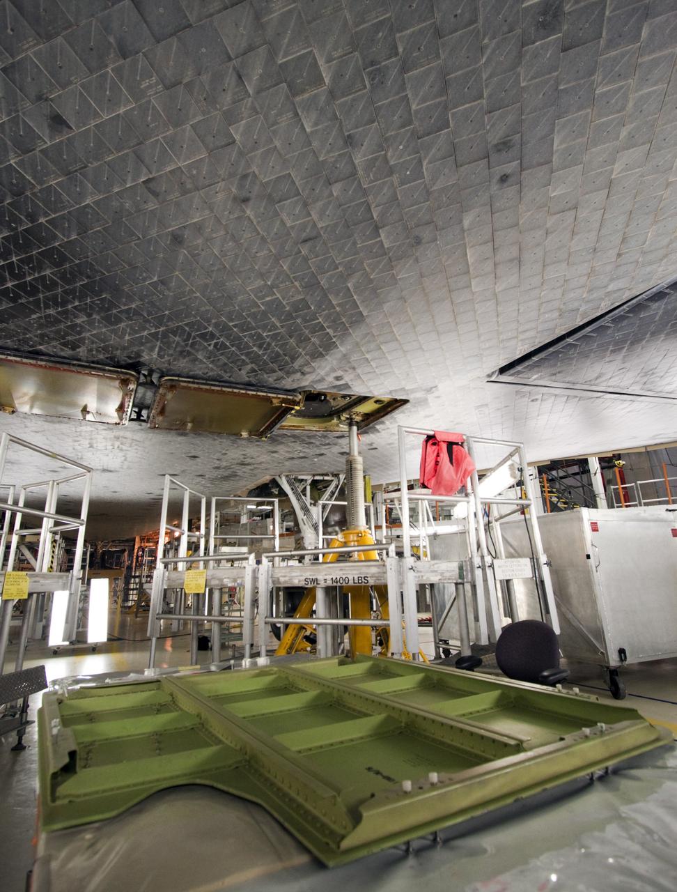 CAPE CANAVERAL, Fla. – Inside Orbiter Processing Facility-2 at NASA’s Kennedy Space Center in Florida, preparations are underway to install the ferry flight doors on space shuttle Endeavour.    The work is part of Transition and Retirement of the remaining space shuttles, Endeavour and Atlantis. Endeavour is being prepared for public display at the California Science Center in Los Angeles. Its ferry flight to California is targeted for mid-September. Endeavour was the last space shuttle added to NASA’s orbiter fleet. Over the course of its 19-year career, Endeavour spent 299 days in space during 25 missions. For more information, visit http://www.nasa.gov/shuttle.  Photo credit: NASA/Jim Grossmann