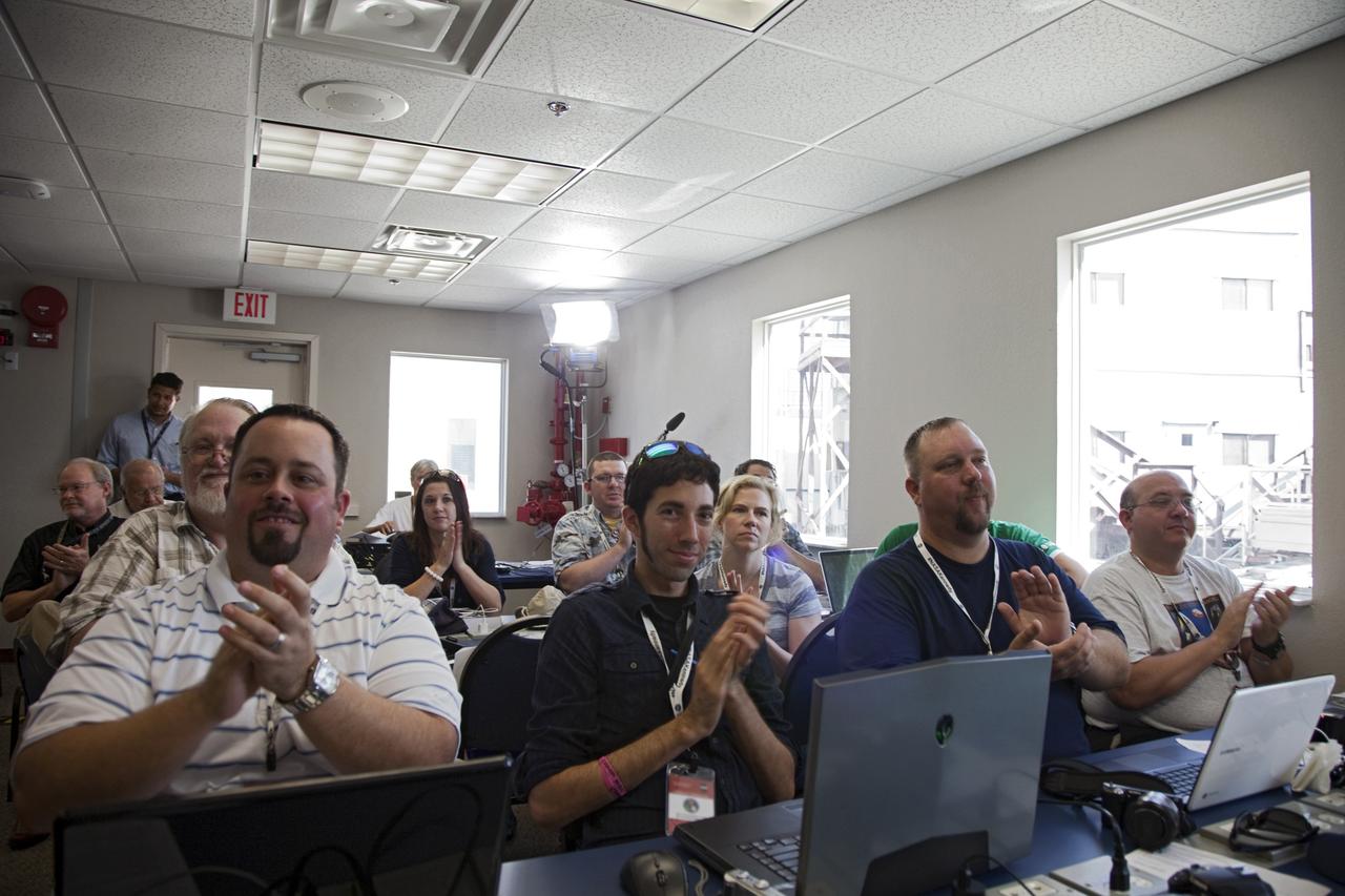 CAPE CANAVERAL, Fla. -- About 45 of NASA’s social media followers respond to a speaker during two days of presentations on the Kennedy Space Center's past, present and future.      The social media participants gathered at the Florida spaceport on Aug. 2 and 3, 2012 to hear from key former and current leaders who related stories of the space agency's efforts to explore the unknown. It was the first social media event totally run by Kennedy. Photo credit: NASA/ Gianni Woods