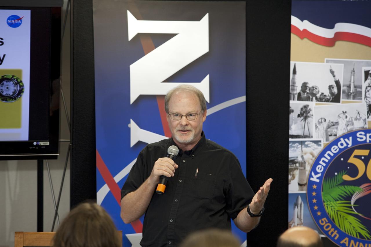 CAPE CANAVERAL, Fla. -- NASA's Bruce Buckingham, of the Kennedy Space Center's Technology Integration Office, speaks to about 45 of social media followers about advances in technology made possible by space research and development. He was one of several speakers to address the participants during two days of presentations on the Kennedy Space Center's past, present and future.      The social media participants gathered at the Florida spaceport on Aug. 2 and 3, 2012 to hear from key former and current leaders who related stories of the space agency's efforts to explore the unknown. It was the first social media event totally run by Kennedy. Photo credit: NASA/ Gianni Woods
