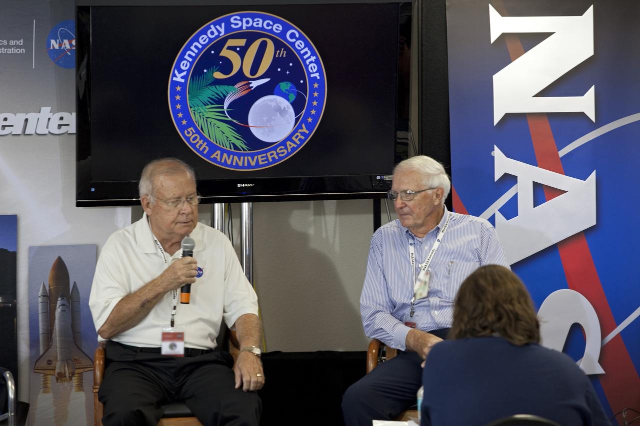 CAPE CANAVERAL, Fla. -- Former Kennedy Space Center Director Jay Honeycutt, left, is joined by Lee Solid, a retired senior executive with Rockwell and Boeing, in speaking to about 45 of NASA’s social media followers for two days of presentations on the Kennedy Space Center's past, present and future.      The social media participants gathered at the Florida spaceport on Aug. 2 and 3, 2012 to hear from key former and current leaders who related stories of the space agency's efforts to explore the unknown. It was the first social media event totally run by Kennedy. Photo credit: NASA/ Gianni Woods