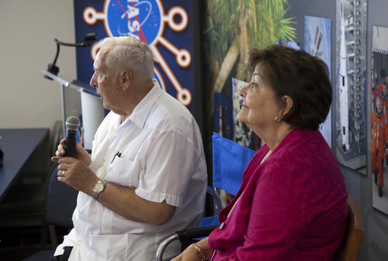 CAPE CANAVERAL, Fla. -- Former NASA Director of Public Affairs Hugh Harris, left, is joined by Jill Rock, of Kennedy's External Relations Office, in speaking to about 45 of NASA’s social media followers about the space agency's extensive efforts to host guests and VIPs over the years. They were among several speakers to address the participants during two days of presentations on the Kennedy Space Center's past, present and future.      The social media participants gathered at the Florida spaceport on Aug. 2 and 3, 2012 to hear from key former and current leaders who related stories of the space agency's efforts to explore the unknown. It was the first social media event totally run by Kennedy. Photo credit: NASA/ Gianni Woods
