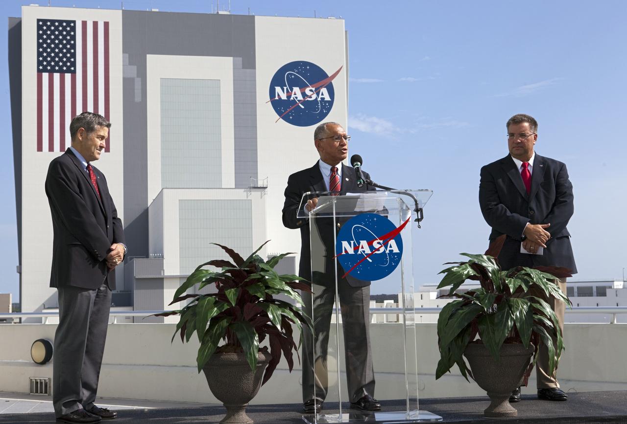 Cape Canaveral, Fla. -- NASA Administrator Charlie Bolden announces the newest partners of NASA's Commercial Crew Program CCP from Operations Support Building 2 OSB II at Kennedy Space Center in Florida. At left, is Kennedy Space Center Director Robert Cabana and at right, is Commercial Crew Program CCP Manager Ed Mango. Three integrated systems were selected for CCP's Commercial Crew Integrated Capability CCiCap initiative to propel America's next human space transportation system to low Earth orbit forward. Operating under funded Space Act Agreements SAAs, The Boeing Co. of Houston, Sierra Nevada Corp. SNC Space Systems of Louisville, Colo., and Space Exploration Technologies SpaceX of Hawthorne, Calif., will spend the next 21 months completing their designs, conducting critical risk reduction testing on their spacecraft and launch vehicles, and showcasing how they would operate and manage missions from launch through orbit and landing, setting the stage for future demonstration missions. To learn more about CCP, which is based at Kennedy and supported by NASA's Johnson Space Center in Houston, visit www.nasa.gov/commercialcrew. Photo credit: NASA/Kim Shiflett