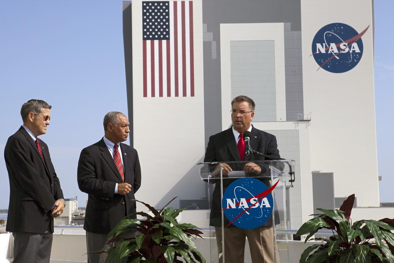 Cape Canaveral, Fla. -- NASA Commercial Crew Program CCP Manager Ed Mango discusses the program's newest partnerships from the Operations Support Building 2 OSB II at Kennedy Space Center in Florida. From left, are Kennedy Space Center Director Robert Cabana and NASA Administrator Charlie Bolden. Three integrated systems were selected for CCP's Commercial Crew Integrated Capability CCiCap initiative to propel America's next human space transportation system to low Earth orbit forward. Operating under funded Space Act Agreements SAAs, The Boeing Co. of Houston, Sierra Nevada Corp. SNC Space Systems of Louisville, Colo., and Space Exploration Technologies SpaceX of Hawthorne, Calif., will spend the next 21 months completing their designs, conducting critical risk reduction testing on their spacecraft and launch vehicles, and showcasing how they would operate and manage missions from launch through orbit and landing, setting the stage for future demonstration missions. To learn more about CCP, which is based at Kennedy and supported by NASA's Johnson Space Center in Houston, visit www.nasa.gov/commercialcrew. Photo credit: NASA/Kim Shiflett