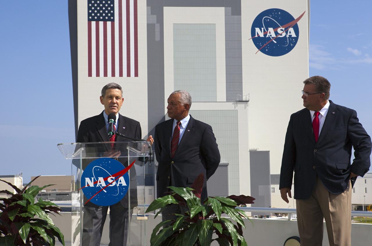 Cape Canaveral, Fla. -- NASA Kennedy Space Center Director Bob Cabana discusses the Commercial Crew Program's CCP newest partnerships from the center's Operations Support Building 2 OSB II. To his right, is NASA Administrator Charlie Bolden, and to his far right, is Commercial Crew Program Manager Ed Mango. Three integrated systems were selected for CCP's Commercial Crew Integrated Capability CCiCap initiative to propel America's next human space transportation system to low Earth orbit forward. Operating under funded Space Act Agreements SAAs, The Boeing Co. of Houston, Sierra Nevada Corp. SNC Space Systems of Louisville, Colo., and Space Exploration Technologies SpaceX of Hawthorne, Calif., will spend the next 21 months completing their designs, conducting critical risk reduction testing on their spacecraft and launch vehicles, and showcasing how they would operate and manage missions from launch through orbit and landing, setting the stage for future demonstration missions. To learn more about CCP, which is based at Kennedy and supported by NASA's Johnson Space Center in Houston, visit www.nasa.gov/commercialcrew. Photo credit: NASA/Kim Shiflett