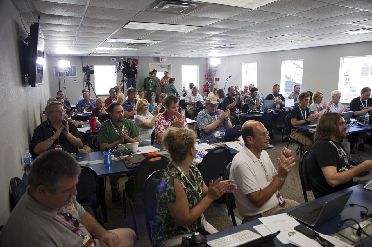 CAPE CANAVERAL, Fla. -- About 45 of NASA’s social media followers respond to a speaker during two days of presentations on the Kennedy Space Center's past, present and future.      The social media participants gathered at the Florida spaceport on Aug. 2 and 3, 2012 to hear from key former and current leaders who related stories of the space agency's efforts to explore the unknown. It was the first social media event totally run by Kennedy. Photo credit: NASA/ Gianni Woods