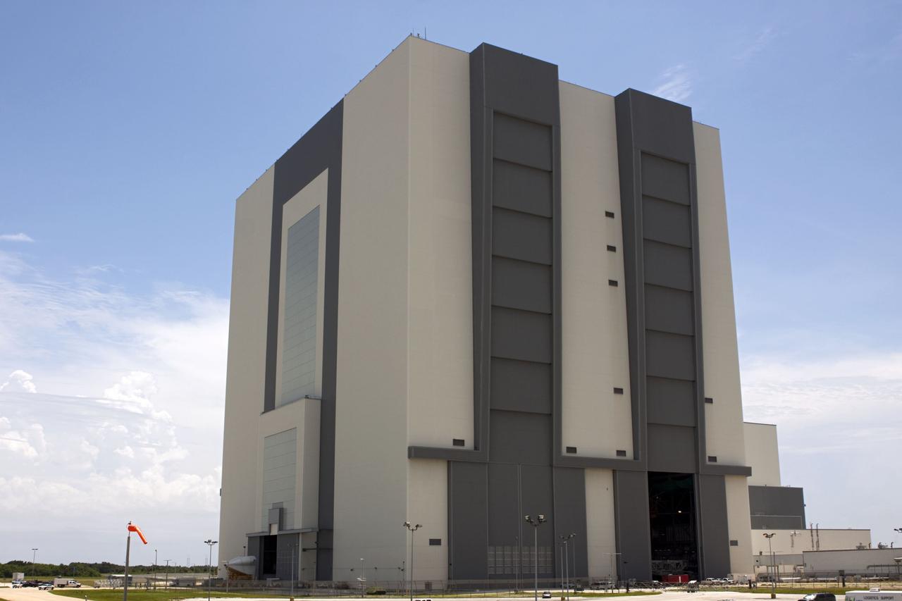 CAPE CANAVERAL, Fla. -- The tail cone that will cover space shuttle Endeavour’s replica shuttle main engines sits outside of the Vehicle Assembly Building at NASA’s Kennedy Space Center in Florida. The tail cone will be transported to Orbiter Processing Facility-2 for installation on Endeavour.    The work is part of Transition and Retirement of the remaining space shuttles, Endeavour and Atlantis. Endeavour is being prepared for public display at the California Science Center in Los Angeles. Its ferry flight to California is targeted for mid-September. Endeavour was the last space shuttle added to NASA’s orbiter fleet. Over the course of its 19-year career, Endeavour spent 299 days in space during 25 missions. For more information, visit http://www.nasa.gov/shuttle.  Photo credit: NASA/Jim Grossmann