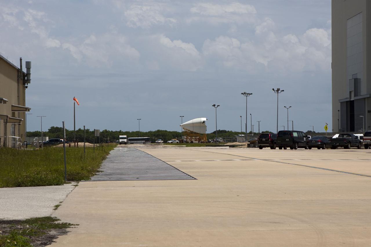 CAPE CANAVERAL, Fla. -- The tail cone that will cover space shuttle Endeavour’s replica shuttle main engines is being transported from the Vehicle Assembly Building at NASA’s Kennedy Space Center in Florida to Orbiter Processing Facility-2.    The work is part of Transition and Retirement of the remaining space shuttles, Endeavour and Atlantis. Endeavour is being prepared for public display at the California Science Center in Los Angeles. Its ferry flight to California is targeted for mid-September. Endeavour was the last space shuttle added to NASA’s orbiter fleet. Over the course of its 19-year career, Endeavour spent 299 days in space during 25 missions. For more information, visit http://www.nasa.gov/shuttle.  Photo credit: NASA/Jim Grossmann