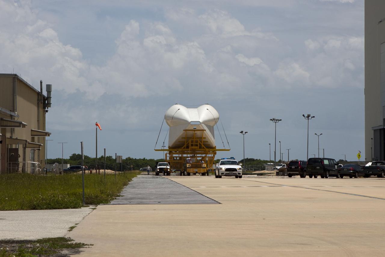 CAPE CANAVERAL, Fla. -- The tail cone that will cover space shuttle Endeavour’s replica shuttle main engines is being transported from the Vehicle Assembly Building at NASA’s Kennedy Space Center in Florida to Orbiter Processing Facility-2.    The work is part of Transition and Retirement of the remaining space shuttles, Endeavour and Atlantis. Endeavour is being prepared for public display at the California Science Center in Los Angeles. Its ferry flight to California is targeted for mid-September. Endeavour was the last space shuttle added to NASA’s orbiter fleet. Over the course of its 19-year career, Endeavour spent 299 days in space during 25 missions. For more information, visit http://www.nasa.gov/shuttle.  Photo credit: NASA/Jim Grossmann