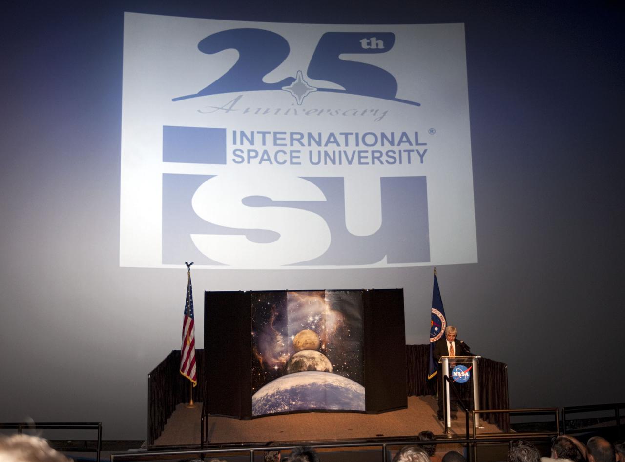 CAPE CANAVERAL, Fla. – Gary Martin, 2012 director of Space Studies Program for the International Space University, or ISU, welcomes graduates and guest gather for the closing ceremonies for the ISU at the Kennedy Space center Visitor Complex on Aug. 3, 2012.      The International Space University is a nine-week intensive course designed for post-graduate university students and professionals during the summer. The program is hosted by a different country each year, providing a unique educational experience for participants from around the world. NASA Kennedy Space Center and the Florida Institute of Technology co-hosted this year's event which ran from June 4 to Aug. 3. There were about 125 participants representing 31 countries. For more information, visit http://www.isunet.edu Photo credit: NASA/Kim Shiflett