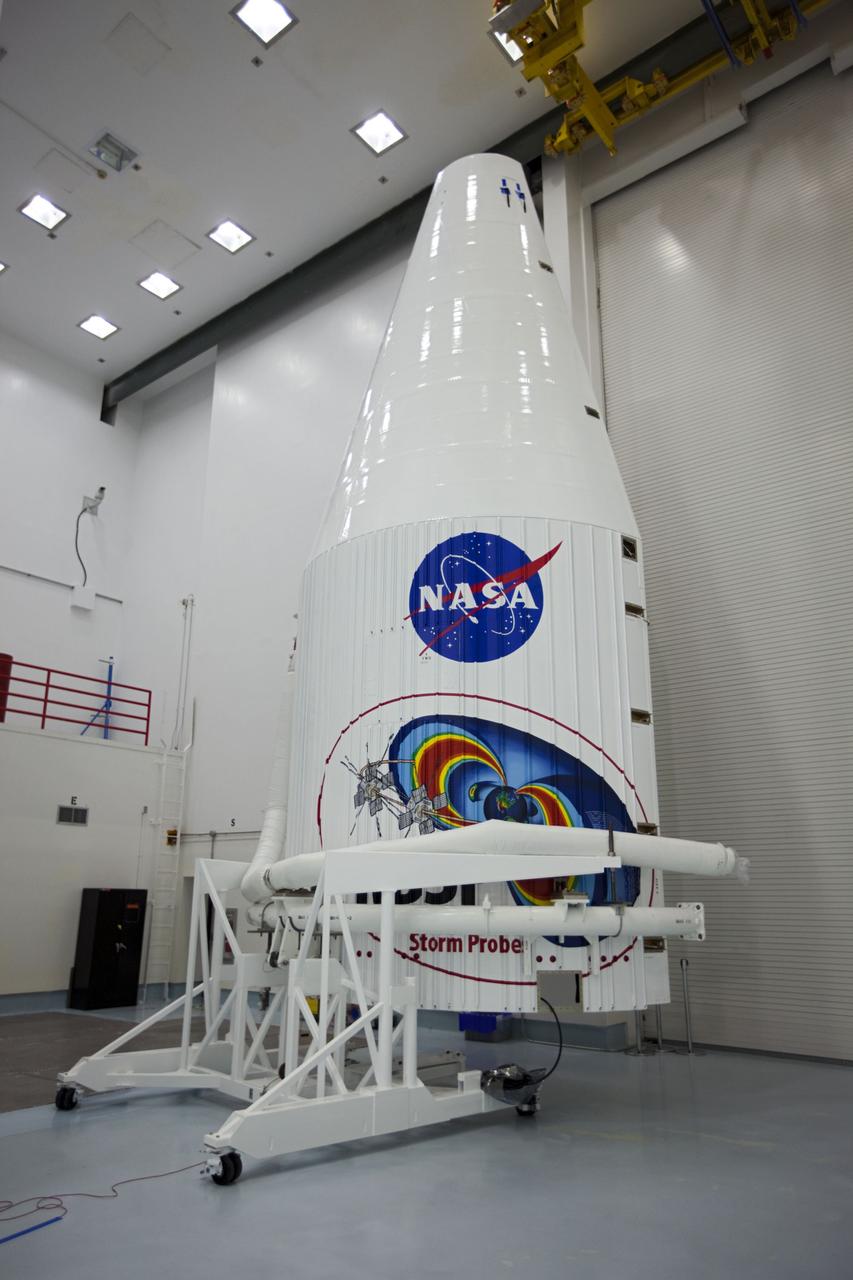 TITUSVILLE, Fla. - Inside the Astrotech payload processing facility near NASA’s Kennedy Space Center in Florida, the nose faring is being prepared for encapsulation with the Radiation Belt Storm Probes, or RBSP, spacecraft. The payload faring. The fairing will house and protect the RBSP during liftoff and flight through the atmosphere aboard an Atlas V rocket. NASA’s RBSP mission will help us understand the sun’s influence on Earth and near-Earth space by studying the Earth’s radiation belts on various scales of space and time. RBSP will begin its mission of exploration of Earth’s Van Allen radiation belts and the extremes of space weather after its liftoff aboard a United Launch Alliance Atlas V from Space Launch Complex 41 at Cape Canaveral Air Force Station, Fla. Liftoff is targeted for Aug. 23, 2012. For more information, visit http://www.nasa.gov/rbsp. Photo credit: NASA/ Kim Shiflett