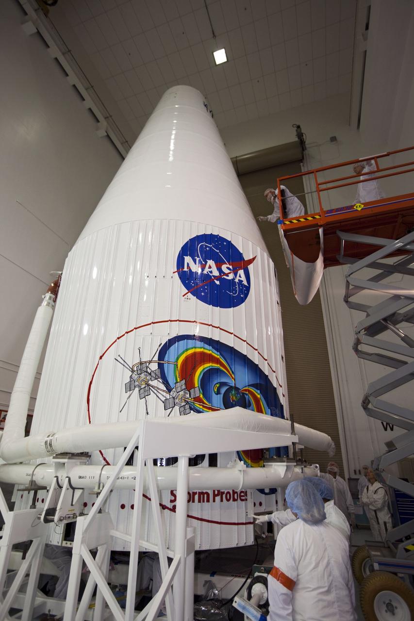 TITUSVILLE, Fla. - Inside the Astrotech payload processing facility in Titusville, Fla. near NASA’s Kennedy Space Center, technicians complete checkouts following encapsulation of the two Radiation Belt Storm Probes, or RBSP, spacecraft with its payload faring. The fairing will house and protect the RBSP during liftoff and flight through the atmosphere aboard an Atlas V rocket. NASA’s RBSP mission will help us understand the sun’s influence on Earth and near-Earth space by studying the Earth’s radiation belts on various scales of space and time. RBSP will begin its mission of exploration of Earth’s Van Allen radiation belts and the extremes of space weather after its liftoff aboard a United Launch Alliance Atlas V from Space Launch Complex 41 at Cape Canaveral Air Force Station, Fla. Liftoff is targeted for Aug. 23, 2012. For more information, visit http://www.nasa.gov/rbsp. Photo credit: NASA/ Kim Shiflett