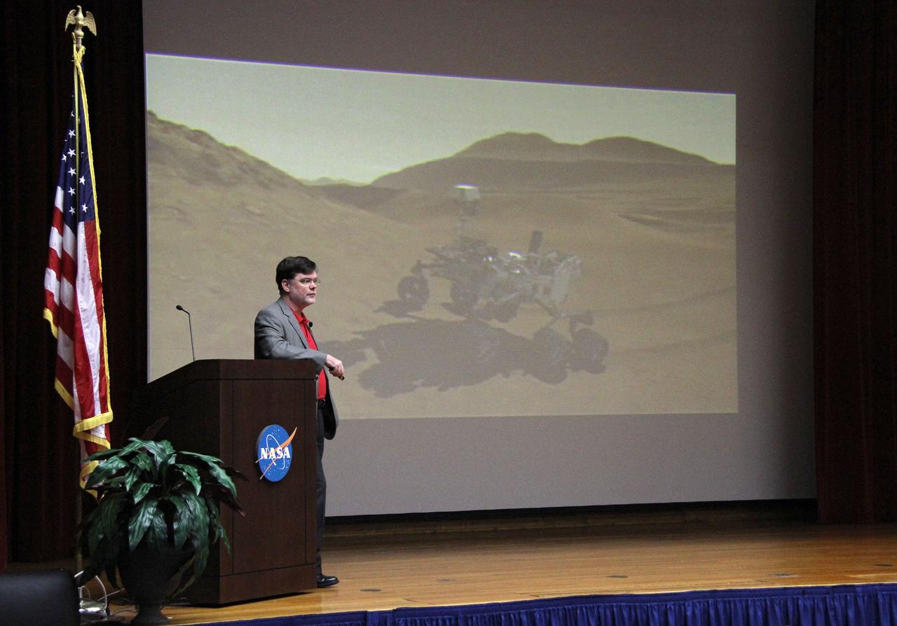 CAPE CANAVERAL, Fla. –Jim Adams, NASA's deputy chief technologist, discusses the successful landing of the Mars Science Laboratory rover Curiosity on Mars during a session with NASA's Kennedy Space Center employees in the training auditorium at the center. Photo credit: NASA/Cory Huston