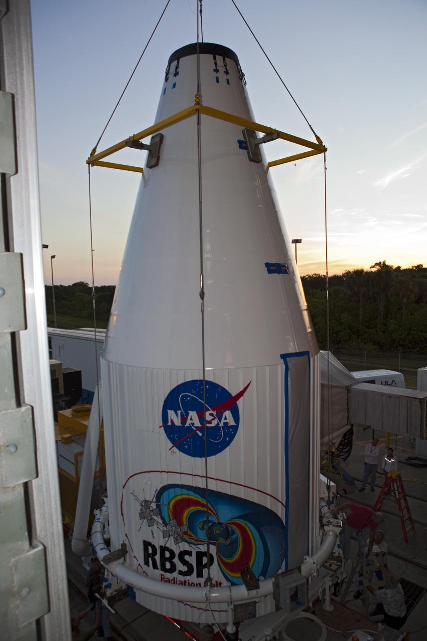CAPE CANAVERAL, Fla. – The Radiation Belt Storm Probes, or RBSP, spacecraft inside their payload fairing are prepared before they are hoisted to the top of a United Launch Alliance Atlas V rocket at Space Launch Complex-41 at Cape Canaveral Air Force Station. The two spacecraft are designed to study the Van Allen radiation belts in unprecedented detail. Photo credit: NASA/Dmitri Gerondidakis