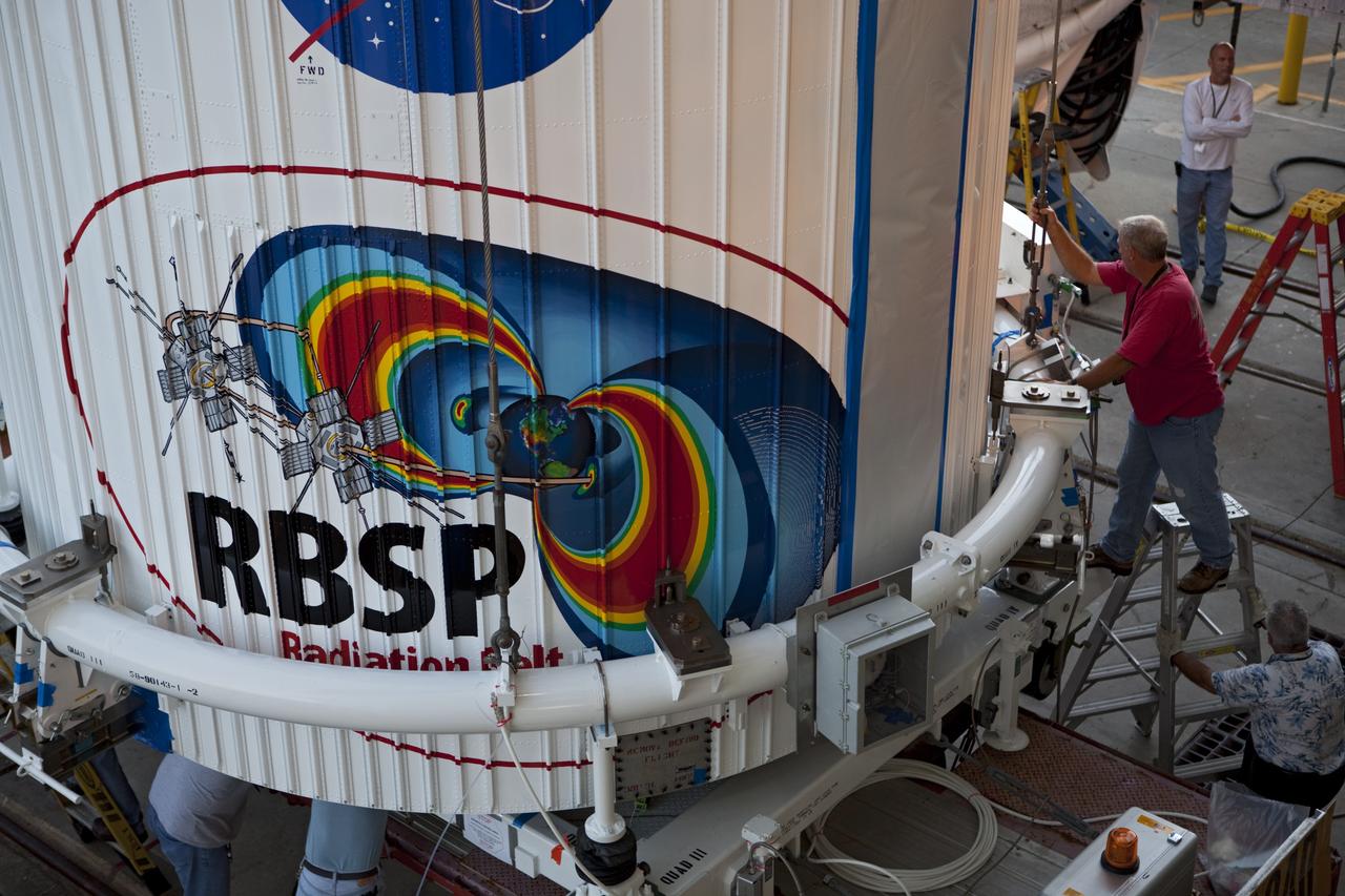 CAPE CANAVERAL, Fla. – The Radiation Belt Storm Probes, or RBSP, spacecraft inside their payload fairing are prepared before they are hoisted to the top of a United Launch Alliance Atlas V rocket at Space Launch Complex-41 at Cape Canaveral Air Force Station. The two spacecraft are designed to study the Van Allen radiation belts in unprecedented detail. Photo credit: NASA/Dmitri Gerondidakis