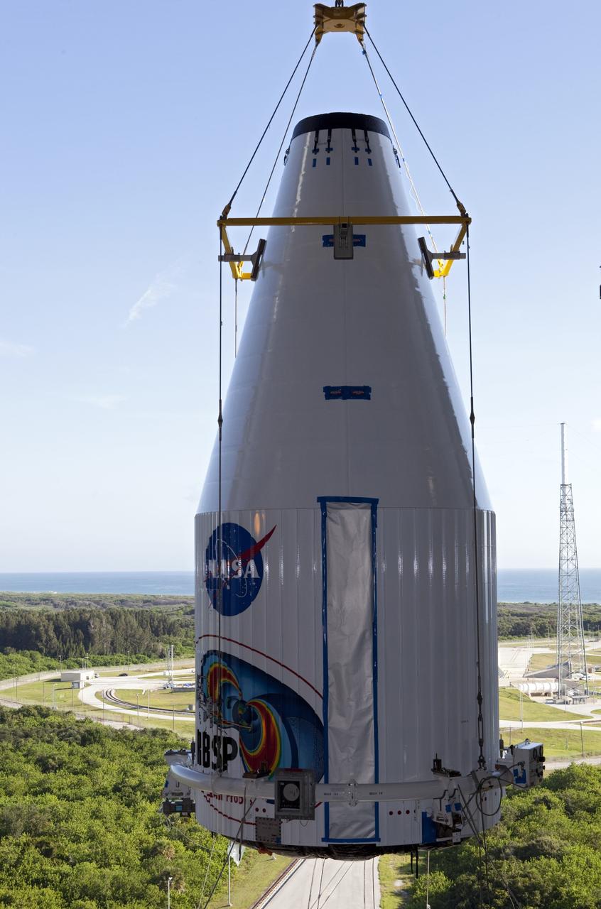 CAPE CANAVERAL, Fla. – Technicians hoist the Radiation Belt Storm Probes, or RBSP, spacecraft inside their payload fairing to the top of a United Launch Alliance Atlas V rocket at Space Launch Complex-41 at Cape Canaveral Air Force Station. The two spacecraft are designed to study the Van Allen radiation belts in unprecedented detail. Photo credit: NASA/Dmitri Gerondidakis
