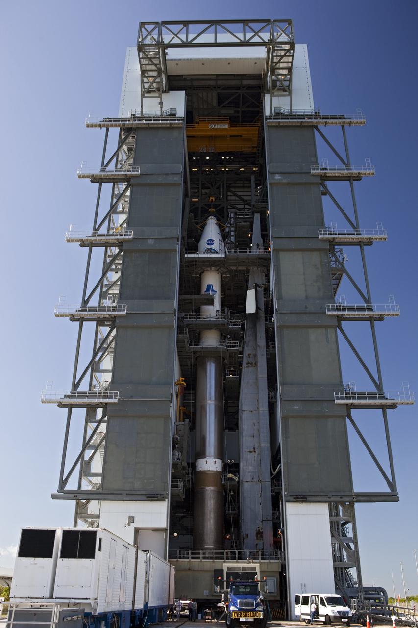 CAPE CANAVERAL, Fla. – Tucked inside their payload fairing, the twin Radiation Belt Storm Probes, or RBSP, spacecraft stand atop a United Launch Alliance Atlas V rocket at Space Launch Complex-41 at Cape Canaveral Air Force Station. The two spacecraft are designed to study the Van Allen radiation belts in unprecedented detail. Photo credit: NASA/Dmitri Gerondidakis
