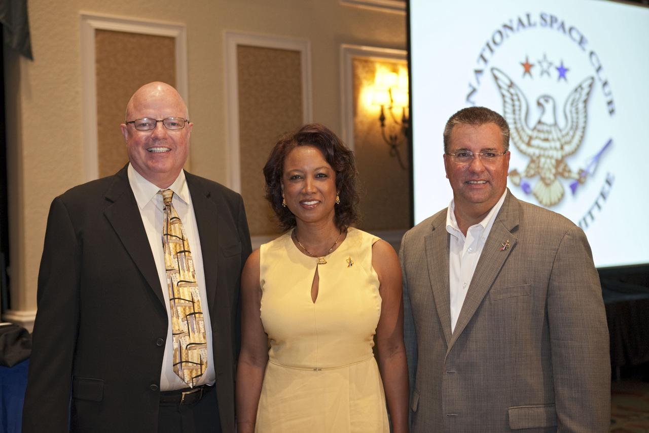 CAPE CANAVERAL, Fla. -- National Space Club Florida Committee Chair Steve Griffin, left, Florida's Lt. Gov. Jennifer Carroll, and NASA Commercial Crew Program Manager Ed Mango pose for a photo at the club's August luncheon at the Radisson Resort at the Port in Cape Canaveral, Fla. Mango was the event's guest speaker, discussing the innovative steps the agency is taking with industry partners to develop the next U.S. space transportation capability to and from low Earth orbit, which will eventually be available for use by the U.S. government and other commercial customers. To learn more about the Commercial Crew Program, visit www.nasa.gov/commercialcrew. Photo credit: Kim Shiflett