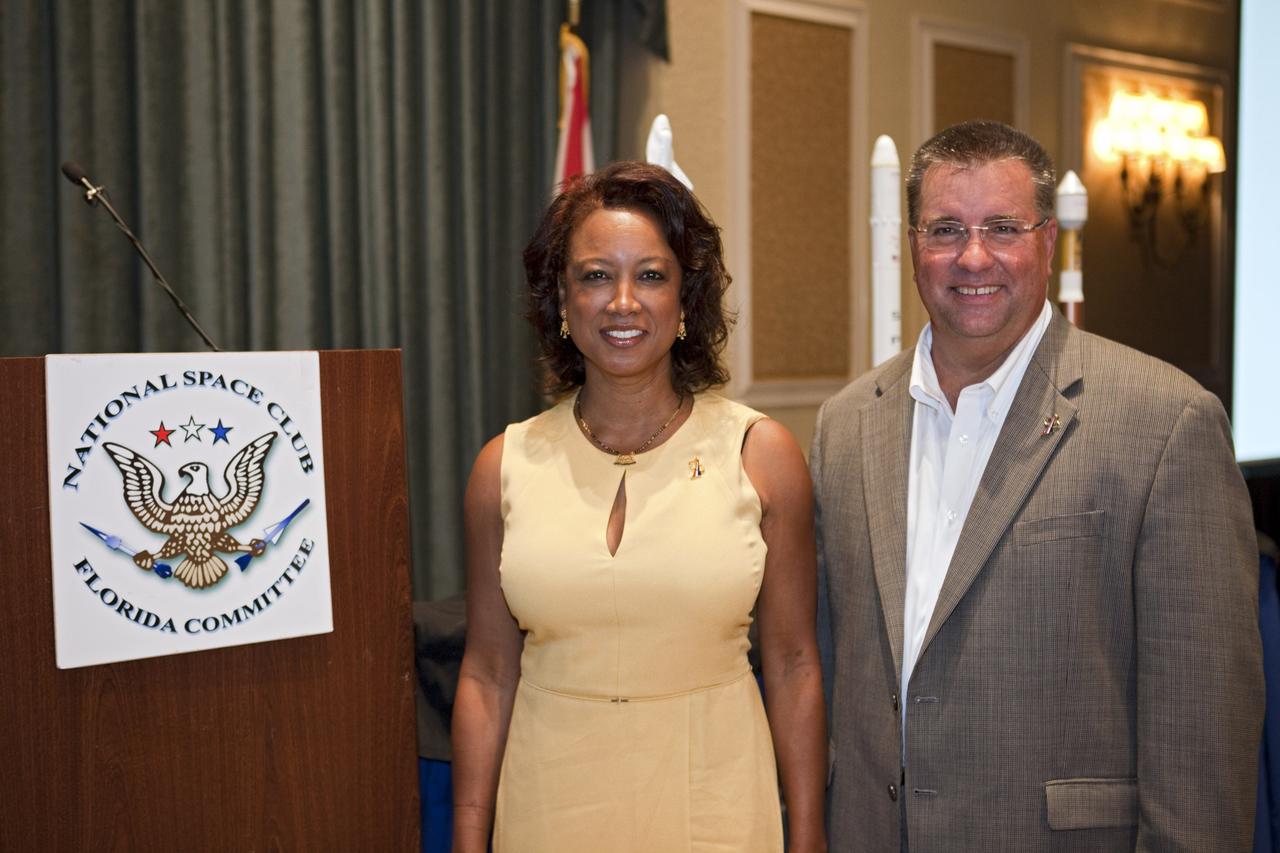 CAPE CANAVERAL, Fla. -- Florida's Lt. Gov. Jennifer Carroll, left, and NASA Commercial Crew Program Manager Ed Mango pose for a photo at the National Space Club Florida Committee's August luncheon at the Radisson Resort at the Port in Cape Canaveral, Fla. Mango was the event's guest speaker, discussing the innovative steps the agency is taking with industry partners to develop the next U.S. space transportation capability to and from low Earth orbit, which will eventually be available for use by the U.S. government and other commercial customers. To learn more about the Commercial Crew Program, visit www.nasa.gov/commercialcrew. Photo credit: Kim Shiflett