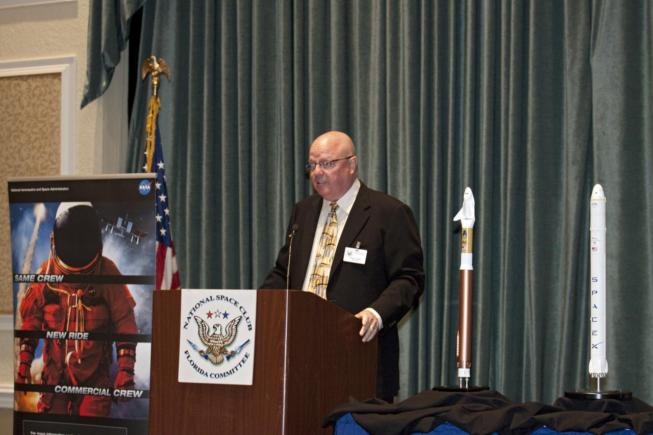 CAPE CANAVERAL, Fla. -- National Space Club Florida Committee Chair Steve Griffin welcomes attendees of the club's August luncheon at the Radisson Resort at the Port in Cape Canaveral, Fla. NASA Commercial Crew Program Manager Ed Mango was the event's guest speaker, discussing the innovative steps the agency is taking with industry partners to develop the next U.S. space transportation capability to and from low Earth orbit, which will eventually be available for use by the U.S. government and other commercial customers. To learn more about the Commercial Crew Program, visit www.nasa.gov/commercialcrew. Photo credit: Kim Shiflett