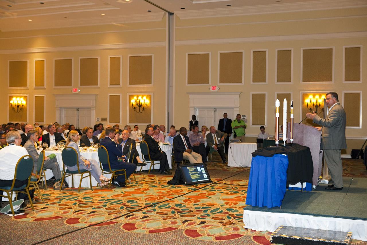 CAPE CANAVERAL, Fla. -- At the National Space Club Florida Committee's August luncheon at the Radisson Resort at the Port in Cape Canaveral, Fla., NASA Commercial Crew Program Manager Ed Mango discusses the innovative steps the agency is taking with industry partners to develop the next U.S. space transportation capability to and from low Earth orbit, which will eventually be available for use by the U.S. government and other commercial customers. To learn more about the Commercial Crew Program, visit www.nasa.gov/commercialcrew. Photo credit: Kim Shiflett