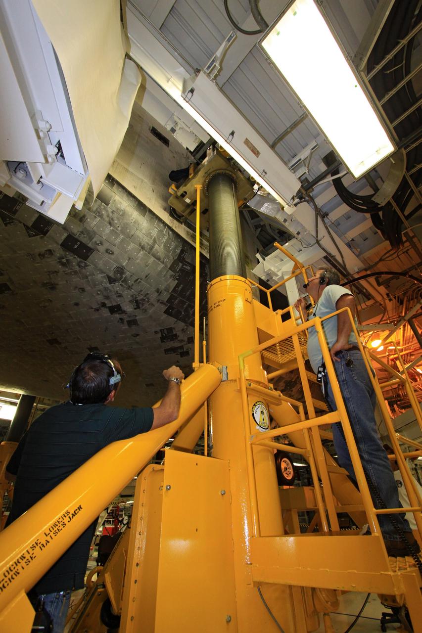 CAPE CANAVERAL, Fla. – In Orbiter Processing Facility Bay 2 at NASA’s Kennedy Space Center in Florida, United Space Alliance technicians monitor an orbiter jack as weight and center of gravity checks are completed on the space shuttle Endeavour. The work is part of Transition and Retirement of the remaining space shuttles, Endeavour and Atlantis. Endeavour is being prepared for public display at the California Science Center in Los Angeles. Its ferry flight to California is targeted for mid-September. Endeavour was the last space shuttle added to NASA’s orbiter fleet. Over the course of its 19-year career, Endeavour spent 299 days in space during 25 missions. For more information, visit http://www.nasa.gov/transition Photo credit: NASA/ Jim Grossmann
