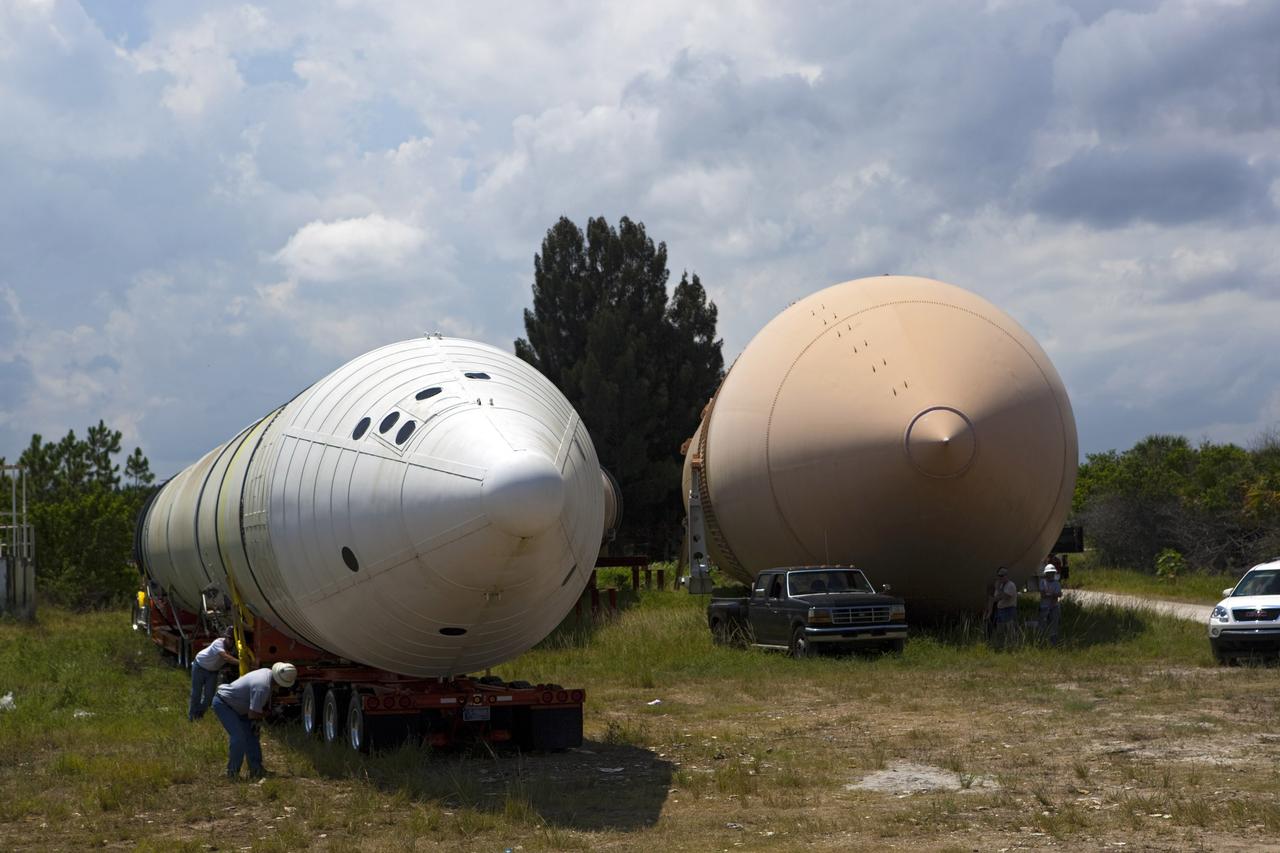 CAPE CANAVERAL, Fla. – At NASA’s Kennedy Space Center in Florida, preparations are underway to load a twin set of space shuttle solid rocket boosters and an external fuel tank on trucks for transport to separate museums.      The solid rocket boosters, or SRBs, will be displayed at the California Science Center in Los Angeles. The external tank soon will be transported for display at the Wings of Dreams Aviation Museum at Keystone Heights Airport between Gainesville and Jacksonville, Fla. The 149-foot SRBs together provided six million pounds of thrust. The external fuel tank contained over 500,000 gallons of liquid hydrogen and liquid oxygen propellant for the shuttle orbiters' three main engines. The work is part of Transition and Retirement of the space shuttle. For more information, visit http://www.nasa.gov/transition Photo credit: NASA/ Dimitri Gerondidakis