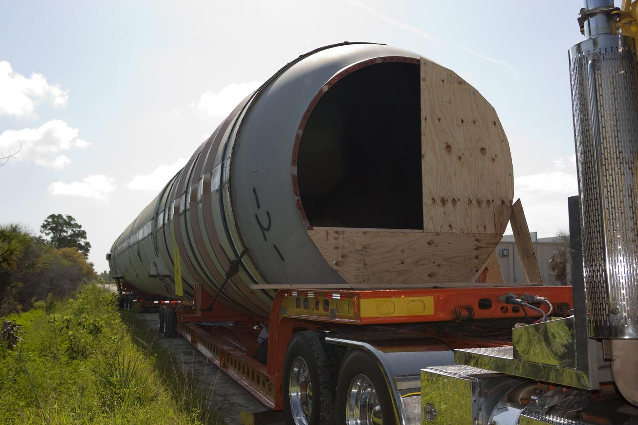 CAPE CANAVERAL, Fla. – At NASA’s Kennedy Space Center in Florida, a space shuttle solid rocket booster has been loaded on a truck. A twin set of space shuttle solid rocket boosters and an external fuel tank are being prepared for transport to separate museums. The solid rocket boosters, or SRBs, will be displayed at the California Science Center in Los Angeles. The external tank soon will be transported for display at the Wings of Dreams Aviation Museum at Keystone Heights Airport between Gainesville and Jacksonville, Fla. The 149-foot SRBs together provided six million pounds of thrust. The external fuel tank contained over 500,000 gallons of liquid hydrogen and liquid oxygen propellant for the shuttle orbiters' three main engines. The work is part of Transition and Retirement of the space shuttle. For more information, visit http://www.nasa.gov/transition Photo credit: NASA/ Dimitri Gerondidakis