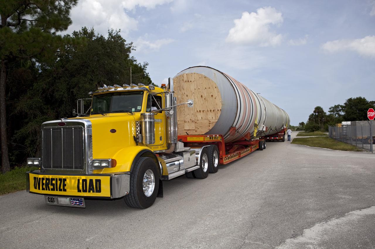 CAPE CANAVERAL, Fla. – At NASA’s Kennedy Space Center in Florida, a space shuttle solid rocket booster has been loaded on to trucks for transport to California. The solid rocket boosters, or SRBs, will be displayed at the California Science Center in Los Angeles. The 149-foot SRBs together provided six million pounds of thrust. The work is part of Transition and Retirement of the space shuttle. For more information, visit http://www.nasa.gov/transition Photo credit: NASA/ Dimitri Gerondidakis