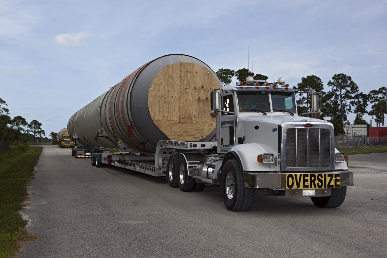 CAPE CANAVERAL, Fla. – At NASA’s Kennedy Space Center in Florida, a twin set of space shuttle solid rocket boosters have been loaded on trucks for transport to California. The solid rocket boosters, or SRBs, will be displayed at the California Science Center in Los Angeles. The 149-foot SRBs together provided six million pounds of thrust. The work is part of Transition and Retirement of the space shuttle. For more information, visit http://www.nasa.gov/transition Photo credit: NASA/ Dimitri Gerondidakis
