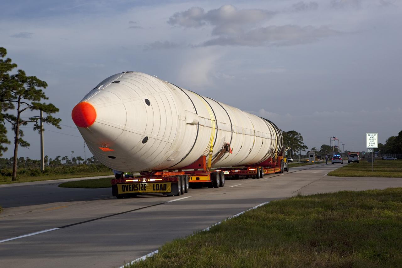 CAPE CANAVERAL, Fla. – At NASA’s Kennedy Space Center in Florida, a space shuttle solid rocket booster is being transported by truck to California. The solid rocket boosters, or SRBs, will be displayed at the California Science Center in Los Angeles. The 149-foot SRBs together provided six million pounds of thrust. The work is part of Transition and Retirement of the space shuttle. For more information, visit http://www.nasa.gov/transition Photo credit: NASA/ Dimitri Gerondidakis