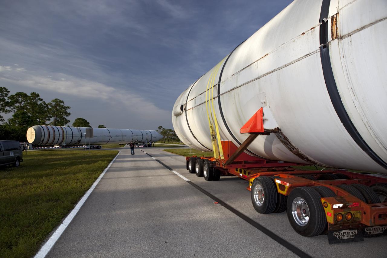 CAPE CANAVERAL, Fla. – At NASA’s Kennedy Space Center in Florida, a twin set of space shuttle solid rocket boosters are being transported by truck to California. The solid rocket boosters, or SRBs, will be displayed at the California Science Center in Los Angeles. The 149-foot SRBs together provided six million pounds of thrust. The work is part of Transition and Retirement of the space shuttle. For more information, visit http://www.nasa.gov/transition Photo credit: NASA/ Dimitri Gerondidakis