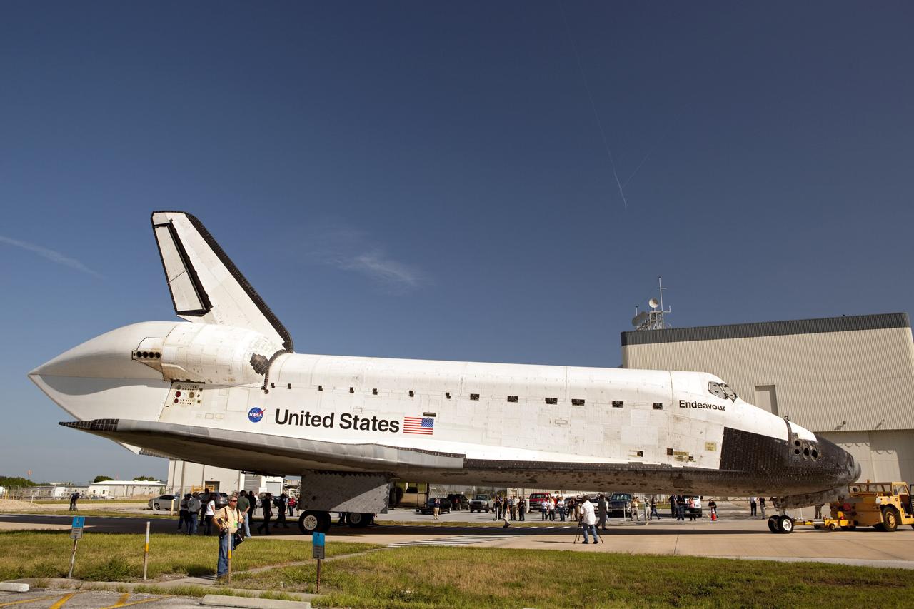 CAPE CANAVERAL, Fla. – The space shuttle Endeavour moves from Bay 2 of the Orbiter Processing Facility to switch places with Atlantis which had been in Vehicle Assembly Building VAB. In the VAB, Endeavour will undergo final preparations for its cross-country ferry flight targeted for mid-September. The work is part of Transition and Retirement of the remaining space shuttles, Endeavour and Atlantis. Endeavour is being prepared for public display at the California Science Center in Los Angeles. Endeavour was the last space shuttle added to NASA’s orbiter fleet. Over the course of its 19-year career, Endeavour spent 299 days in space during 25 missions. For more information, visit http://www.nasa.gov/transition Photo credit: NASA/Dimitri Gerondidakis