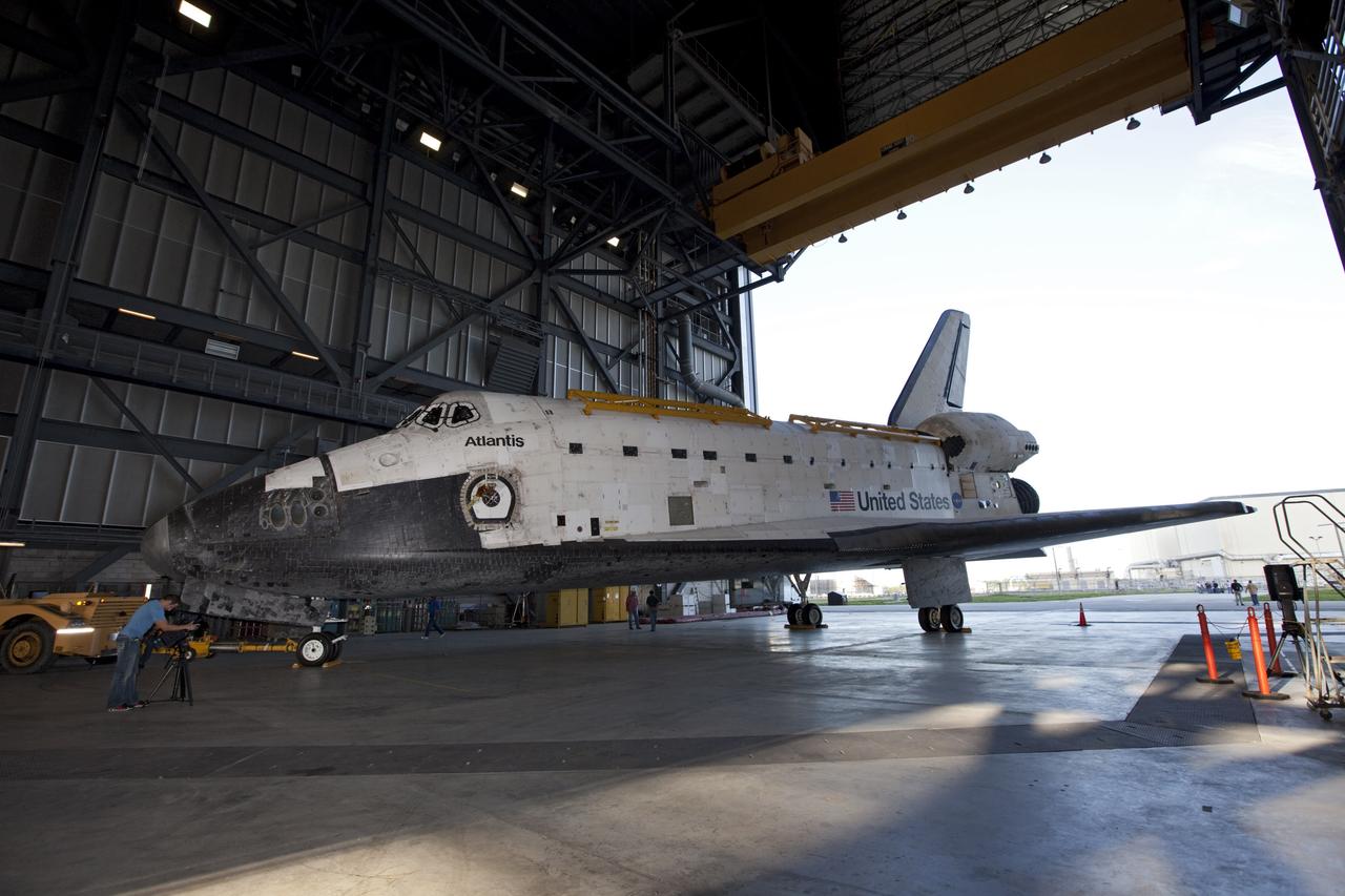 CAPE CANAVERAL, Fla. – The space shuttle Atlantis begins backing out of the Vehicle Assembly Building at NASA's Kennedy Space Center in Florida. Atlantis is switching places with Endeavour which had been in Bay 2 of the Orbiter Processing Facility OPF. In the OPF, Atlantis will undergo final preparations for its transfer to the Kennedy Space Center Visitor Complex targeted for November. The work is part of Transition and Retirement of the remaining space shuttles, Atlantis and Endeavour. Atlantis is being prepared for public display at Kennedy's Visitor Complex. Over the course of its 26-year career, Atlantis spent 293 days in space during 33 missions. For more information, visit http://www.nasa.gov/transition Photo credit: NASA/Kim Shiflett