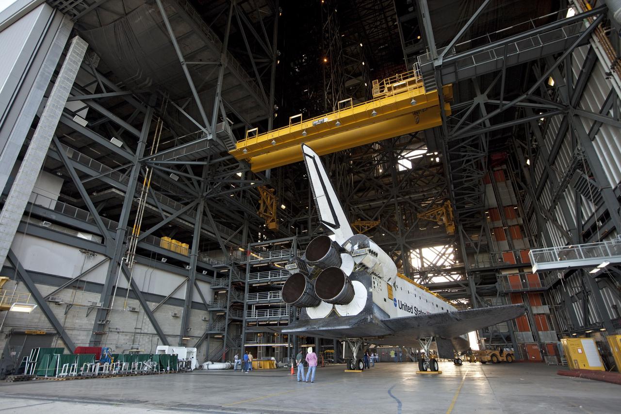 CAPE CANAVERAL, Fla. – The space shuttle Atlantis begins backing out of the Vehicle Assembly Building at NASA's Kennedy Space Center in Florida. Atlantis is switching places with Endeavour which had been in Bay 2 of the Orbiter Processing Facility OPF. In the OPF, Atlantis will undergo final preparations for its transfer to the Kennedy Space Center Visitor Complex targeted for November. The work is part of Transition and Retirement of the remaining space shuttles, Atlantis and Endeavour. Atlantis is being prepared for public display at Kennedy's Visitor Complex. Over the course of its 26-year career, Atlantis spent 293 days in space during 33 missions. For more information, visit http://www.nasa.gov/transition Photo credit: NASA/Kim Shiflett
