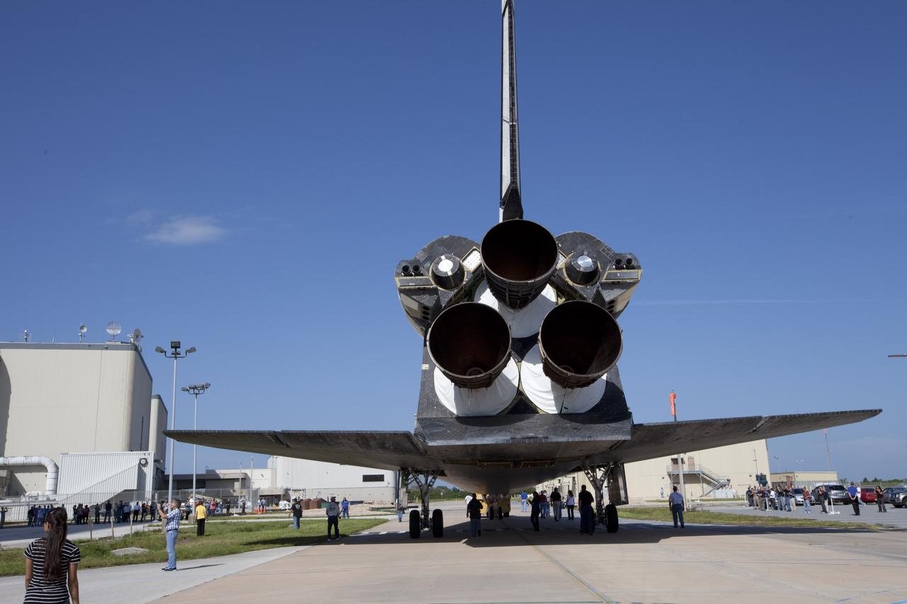 CAPE CANAVERAL, Fla. – The space shuttle Atlantis is towed from the Vehicle Assembly Building at NASA's Kennedy Space Center in Florida. Atlantis is switching places with Endeavour which had been in Bay 2 of the Orbiter Processing Facility OPF. In the OPF, Atlantis will undergo final preparations for its transfer to the Kennedy Space Center Visitor Complex targeted for November. The work is part of Transition and Retirement of the remaining space shuttles, Atlantis and Endeavour. Atlantis is being prepared for public display at Kennedy's Visitor Complex. Over the course of its 26-year career, Atlantis spent 293 days in space during 33 missions. For more information, visit http://www.nasa.gov/transition Photo credit: NASA/Kim Shiflett