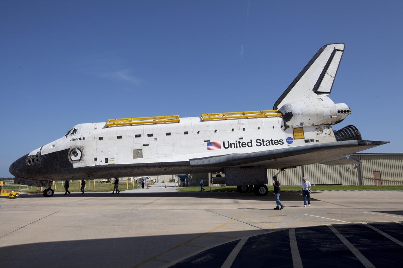 CAPE CANAVERAL, Fla. – The space shuttle Atlantis is towed from the Vehicle Assembly Building at NASA's Kennedy Space Center in Florida. Atlantis is switching places with Endeavour which had been in Bay 2 of the Orbiter Processing Facility OPF. In the OPF, Atlantis will undergo final preparations for its transfer to the Kennedy Space Center Visitor Complex targeted for November. The work is part of Transition and Retirement of the remaining space shuttles, Atlantis and Endeavour. Atlantis is being prepared for public display at Kennedy's Visitor Complex. Over the course of its 26-year career, Atlantis spent 293 days in space during 33 missions. For more information, visit http://www.nasa.gov/transition Photo credit: NASA/Kim Shiflett