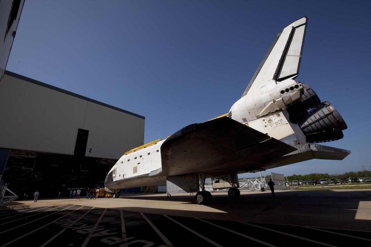 CAPE CANAVERAL, Fla. – The space shuttle Atlantis is towed into Bay 2 of the Orbiter Processing Facility OPF at NASA's Kennedy Space Center in Florida. Atlantis is switching places with Endeavour that moved into the Vehicle Assembly Building. In the OPF, Atlantis will undergo final preparations for its transfer to the Kennedy Space Center Visitor Complex targeted for November. The work is part of Transition and Retirement of the remaining space shuttles, Atlantis and Endeavour. Atlantis is being prepared for public display at Kennedy's Visitor Complex. Over the course of its 26-year career, Atlantis spent 293 days in space during 33 missions. For more information, visit http://www.nasa.gov/transition Photo credit: NASA/Kim Shiflett