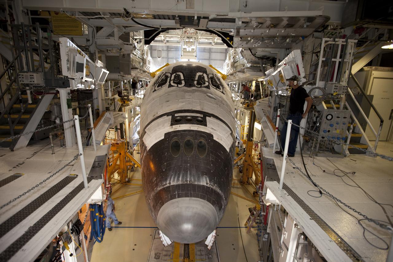 CAPE CANAVERAL, Fla. – This wide-angle view shows the space shuttle Atlantis as it enters Bay 2 of the Orbiter Processing Facility OPF at NASA's Kennedy Space Center in Florida. Atlantis is switching places with Endeavour that moved into the Vehicle Assembly Building. In the OPF, Atlantis will undergo final preparations for its transfer to the Kennedy Space Center Visitor Complex targeted for November. The work is part of Transition and Retirement of the remaining space shuttles, Atlantis and Endeavour. Atlantis is being prepared for public display at Kennedy's Visitor Complex. Over the course of its 26-year career, Atlantis spent 293 days in space during 33 missions. For more information, visit http://www.nasa.gov/transition Photo credit: NASA/Kim Shiflett