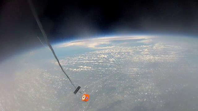 CAPE CANAVERAL, Fla. – An instrument-laden capsule begins its descent from 105,000 feet above Earth during a flight hosted by Rocket University participants. After the high-altitude balloon carrying it burst, the capsule free-fell to 50,000 feet and then deployed a parachute to land safely on the ground. The test flight was used to evaluate the stability of the capsule as it fell to Earth before its parachute opened. Rocket University is a program of courses, workshops, labs and projects offered to engineering and research pros of all stripes to keep their skills fresh and broaden their experiences. Photo credit: Courtesy of Rocket University  The work is part of Transition and Retirement of the remaining space shuttles, Atlantis and Endeavour. Atlantis is being prepared for public display at Kennedy's Visitor Complex. Over the course of its 26-year career, Atlantis spent 293 days in space during 33 missions. For more information, visit http://www.nasa.gov/transition Photo credit: NASA/Kim Shiflett