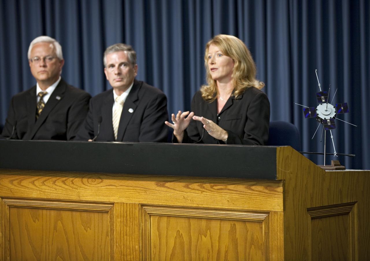 CAPE CANAVERAL, Fla. - At NASA Kennedy Space Center’s Press Site in Florida, Kathy Winters, launch weather officer with the 45th Weather Squadron at Cape Canaveral Air Force Station, answers a question during a prelaunch news conference held for the Radiation Belt Storm Probes, or RBSP, mission. To her left, are Vernon Thorp, United Launch Alliance program manager, NASA missions, and Richard Fitzgerald, RBSP project manager at Johns Hopkins Applied Physics Laboratory in Laurel, Md.     NASA’s RBSP mission will help us understand the sun’s influence on Earth and near-Earth space by studying the Earth’s radiation belts on various scales of space and time. RBSP will begin its mission of exploration of Earth’s Van Allen radiation belts and the extremes of space weather after its launch aboard an Atlas V rocket. Launch is targeted for Aug. 24. For more information, visit http://www.nasa.gov/rbsp. Photo credit: NASA/Glenn Benson