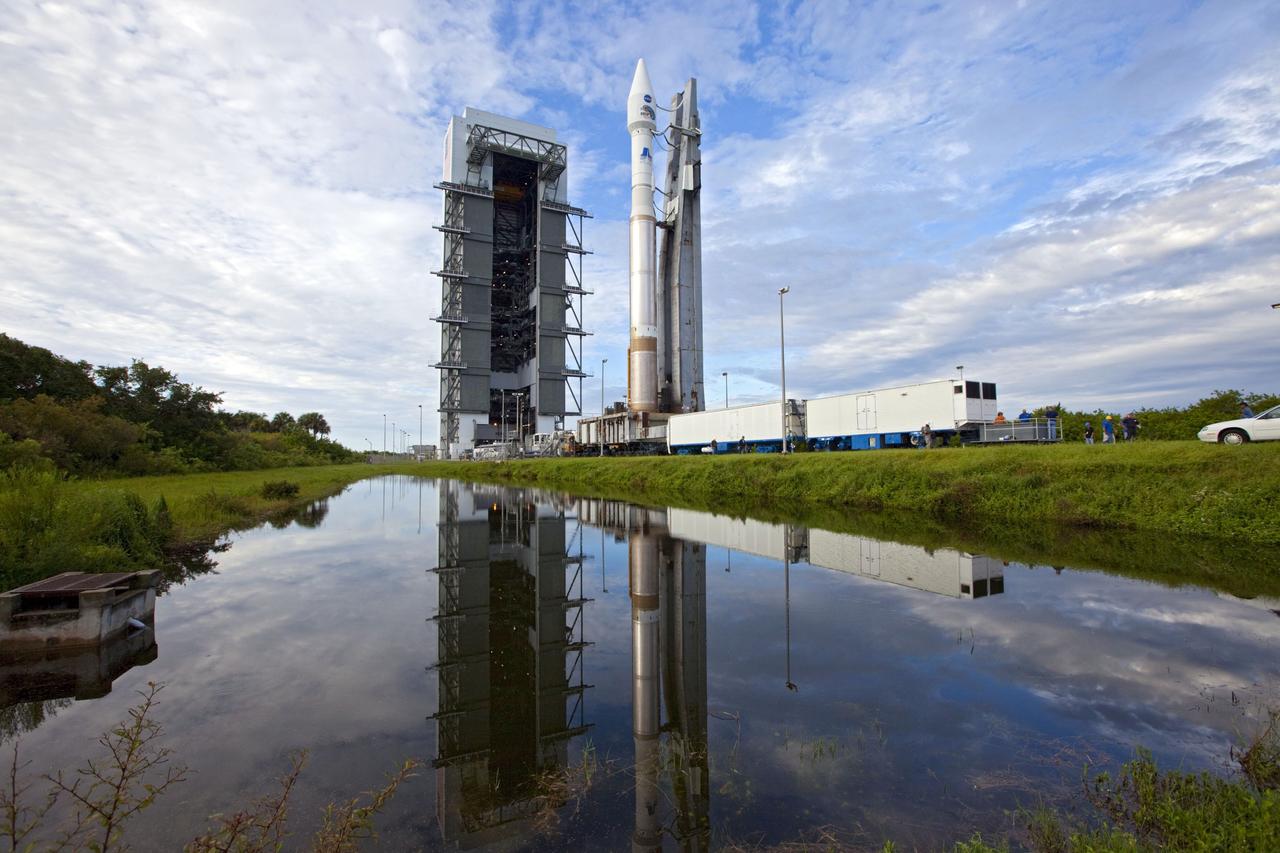 CAPE CANAVERAL, Fla. – The United Launch Alliance Atlas V rocket with the Radiation Belt Storm Probes, or RBSP, spacecraft aboard rolls to the launch pad at Space Launch Complex 41 at Cape Canaveral Air Force Station. NASA’s RBSP mission will help researchers understand the sun’s influence on Earth and near-Earth space by studying the Earth’s radiation belts on various scales of space and time. RBSP will begin its mission of exploration of Earth’s Van Allen radiation belts and the extremes of space weather after its launch aboard an Atlas V rocket. Launch is targeted for Aug. 24. Photo credit: NASA/Kim Shiflett