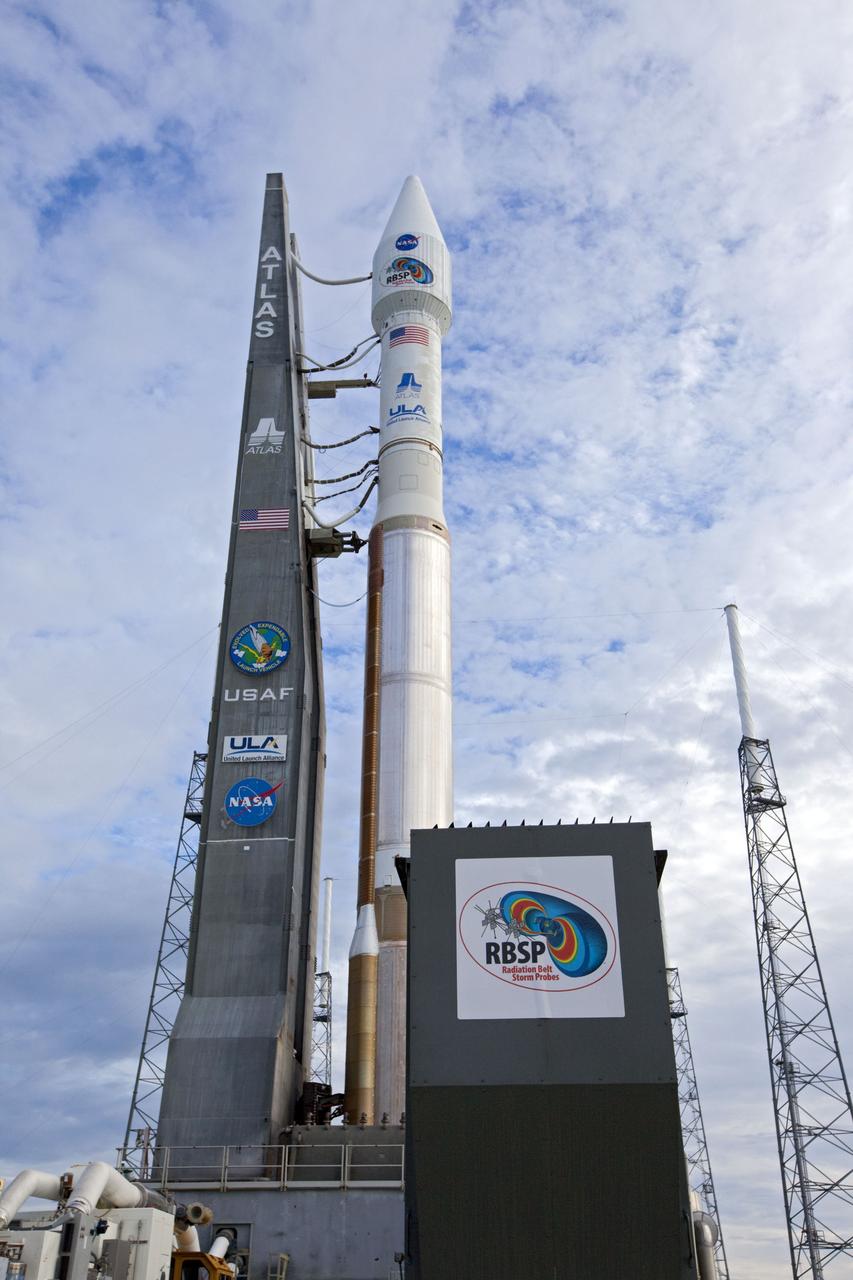 CAPE CANAVERAL, Fla. – The United Launch Alliance Atlas V rocket with the Radiation Belt Storm Probes, or RBSP, spacecraft aboard rolls to the launch pad at Space Launch Complex 41 at Cape Canaveral Air Force Station. NASA’s RBSP mission will help researchers understand the sun’s influence on Earth and near-Earth space by studying the Earth’s radiation belts on various scales of space and time. RBSP will begin its mission of exploration of Earth’s Van Allen radiation belts and the extremes of space weather after its launch aboard an Atlas V rocket. Launch is targeted for Aug. 24. Photo credit: NASA/Kim Shiflett
