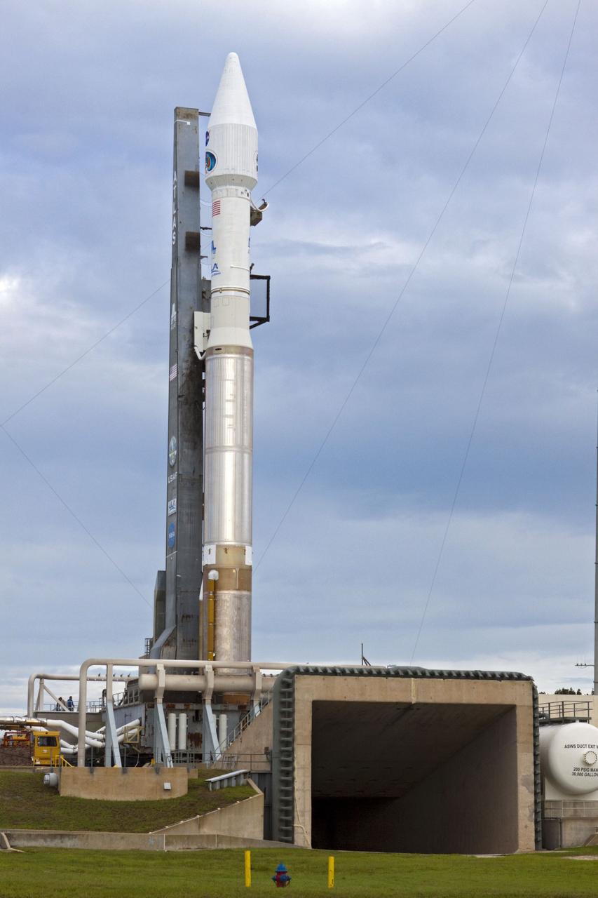CAPE CANAVERAL, Fla. – The United Launch Alliance Atlas V rocket with the Radiation Belt Storm Probes, or RBSP, spacecraft aboard stands at the launch pad at Space Launch Complex 41 at Cape Canaveral Air Force Station. NASA’s RBSP mission will help researchers understand the sun’s influence on Earth and near-Earth space by studying the Earth’s radiation belts on various scales of space and time. RBSP will begin its mission of exploration of Earth’s Van Allen radiation belts and the extremes of space weather after its launch aboard an Atlas V rocket. Launch is targeted for Aug. 24. Photo credit: NASA/Kim Shiflett