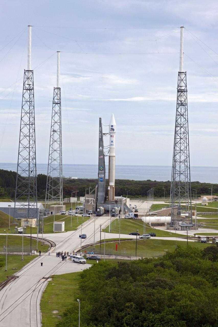 CAPE CANAVERAL, Fla. – The United Launch Alliance Atlas V rocket with the Radiation Belt Storm Probes, or RBSP, spacecraft aboard stands at the launch pad at Space Launch Complex 41 at Cape Canaveral Air Force Station. NASA’s RBSP mission will help researchers understand the sun’s influence on Earth and near-Earth space by studying the Earth’s radiation belts on various scales of space and time. RBSP will begin its mission of exploration of Earth’s Van Allen radiation belts and the extremes of space weather after its launch aboard an Atlas V rocket. Launch is targeted for Aug. 24. Photo credit: NASA/Kim Shiflett