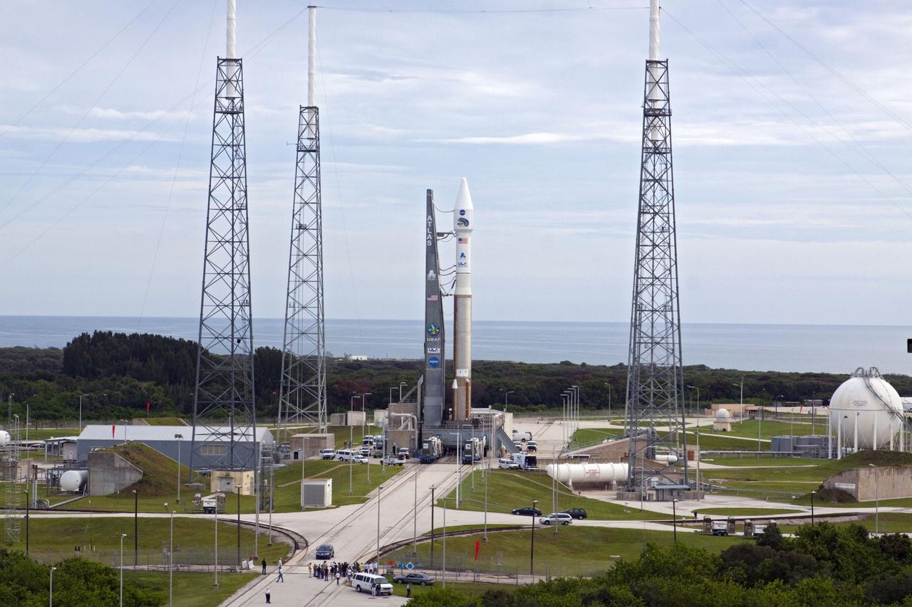 CAPE CANAVERAL, Fla. – The United Launch Alliance Atlas V rocket with the Radiation Belt Storm Probes, or RBSP, spacecraft aboard stands at the launch pad at Space Launch Complex 41 at Cape Canaveral Air Force Station. NASA’s RBSP mission will help researchers understand the sun’s influence on Earth and near-Earth space by studying the Earth’s radiation belts on various scales of space and time. RBSP will begin its mission of exploration of Earth’s Van Allen radiation belts and the extremes of space weather after its launch aboard an Atlas V rocket. Launch is targeted for Aug. 24. Photo credit: NASA/Kim Shiflett
