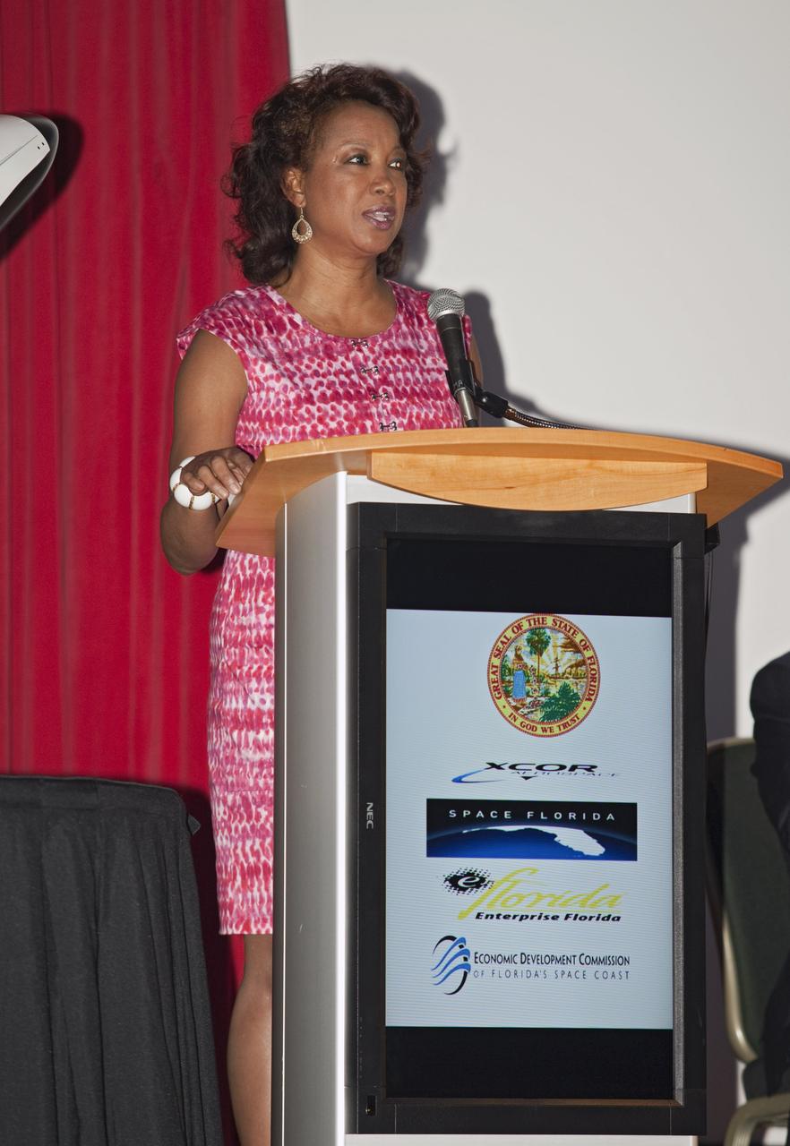CAPE CANAVERAL, Fla. - At NASA's Kennedy Space Center in Florida, Lt. Gov. Jennifer Carroll R-Fla. addresses guests at a presentation during which XCOR Aerospace announced plans to open a manufacturing operation in Brevard.      The company's suborbital Lynx Mark II spacecraft possibly will take off and land at Kennedy's shuttle landing facility. XCOR Aerospace is a small, privately held California corporation with focus on the research, development, project management and production of reusable launch vehicles, rocket engines and rocket propulsion systems. XCOR will focus on space tourism, experimental flights and launching satellites. Photo credit: NASA/ Frankie Martin